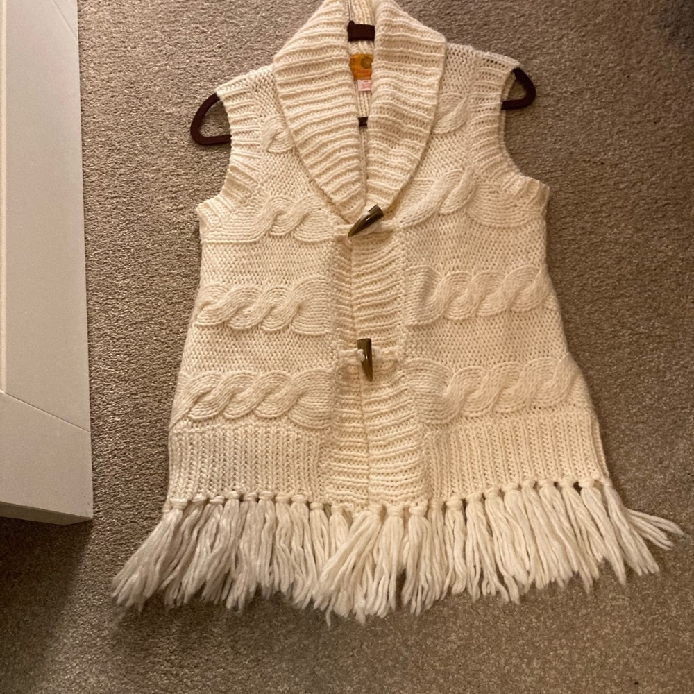 Cream sweater vest with fringe